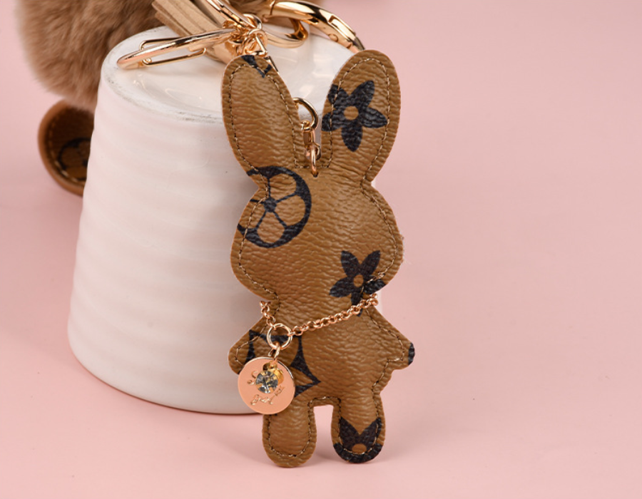 Wholesale Rex rabbit fur ball keychains, cute, plush, mascot car keychains, women's bag pendants.