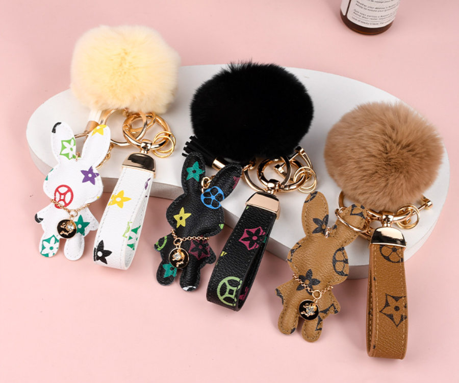 Wholesale Rex rabbit fur ball keychains, cute, plush, mascot car keychains, women's bag pendants.