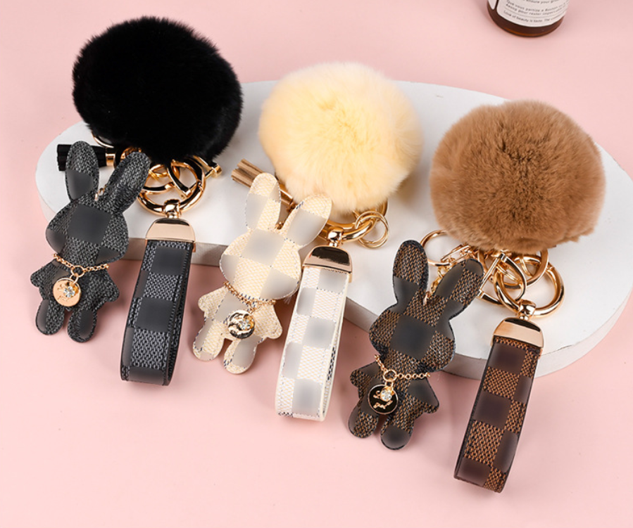 Wholesale Rex rabbit fur ball keychains, cute, plush, mascot car keychains, women's bag pendants.
