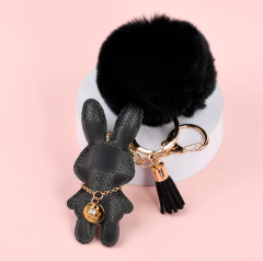 Black plaid rabbit + fur ball