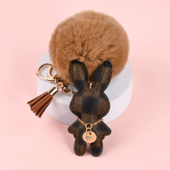 Brown plaid rabbit + fur ball