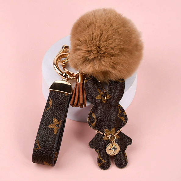Wholesale Rex rabbit fur ball keychains, cute, plush, mascot car keychains.