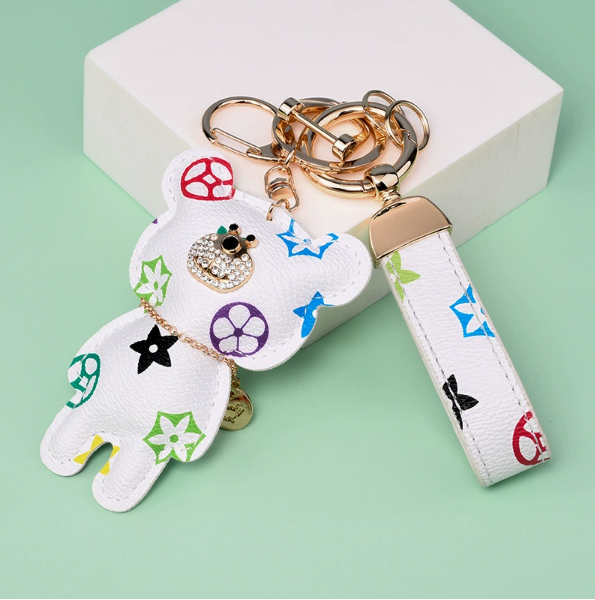 Wholesale old flower standing bear keychain