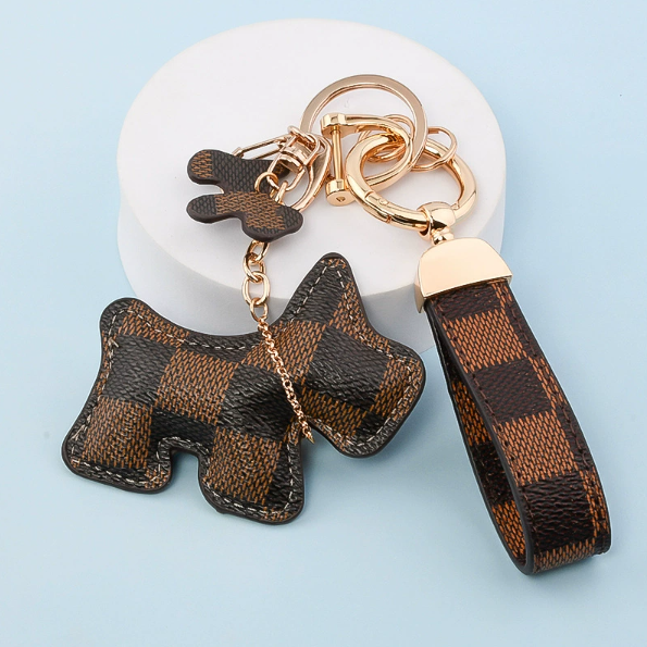 Wholesale bell dog keychain set.