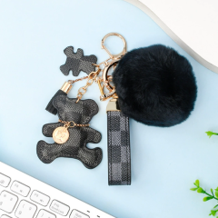 Black plaid bear suit + fur ball