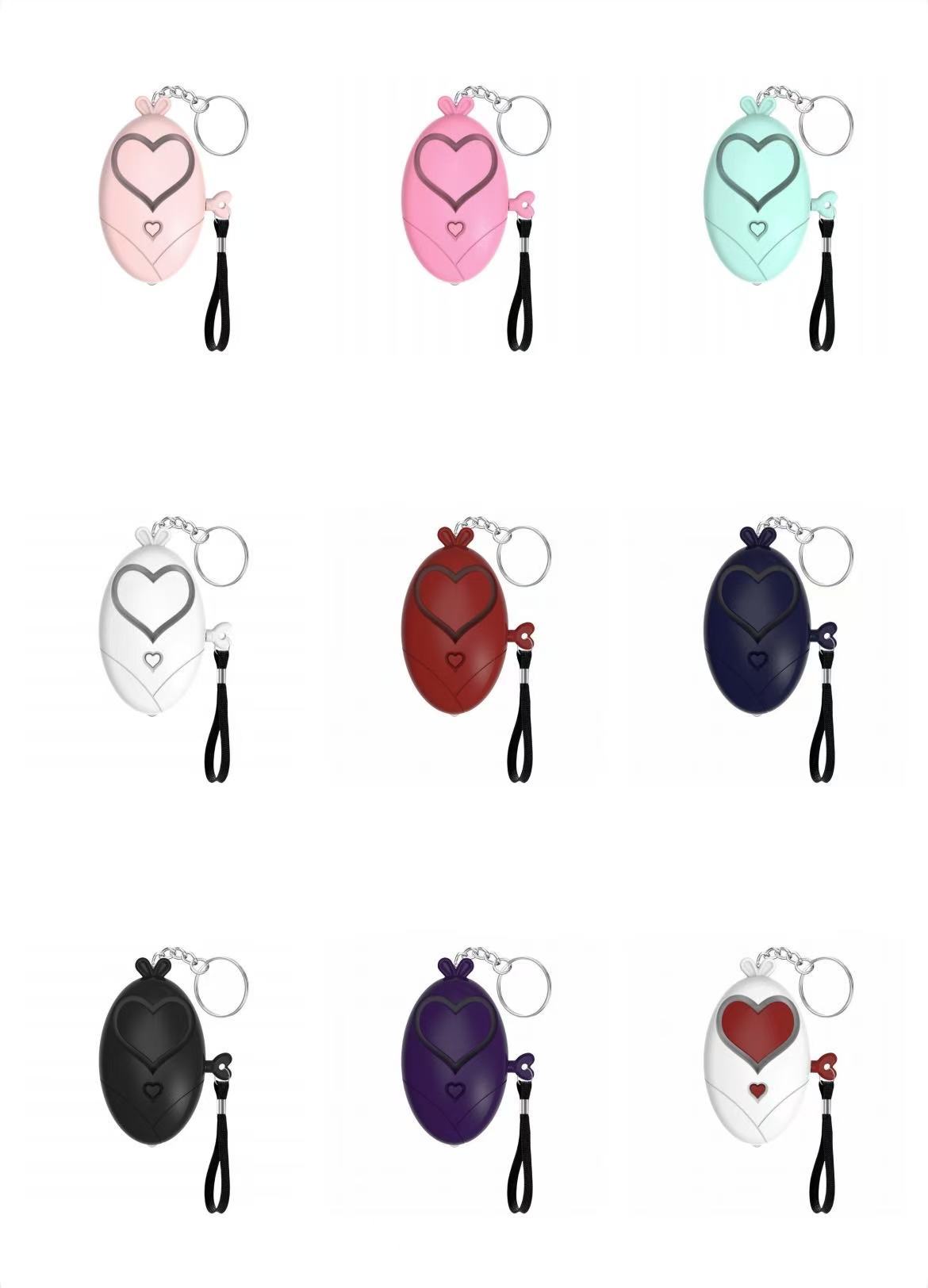 Wholesale heart shaped personal alarm keychain.