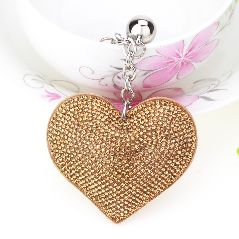 New DIY jewelry small Chanel style peach heart hot diamond leather keychain crystal diamond heart tassel bag pendant