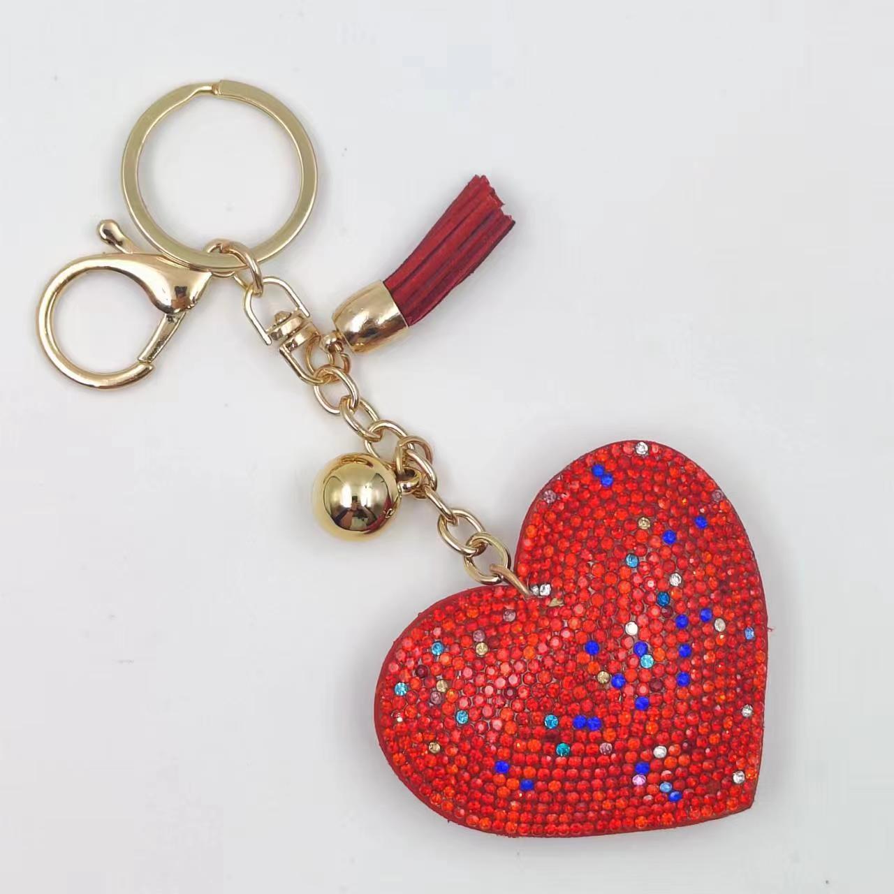 New DIY jewelry small Chanel style peach heart hot diamond leather keychain crystal diamond heart tassel bag pendant