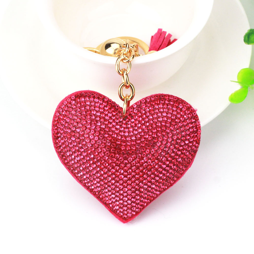 New DIY jewelry small Chanel style peach heart hot diamond leather keychain crystal diamond heart tassel bag pendant