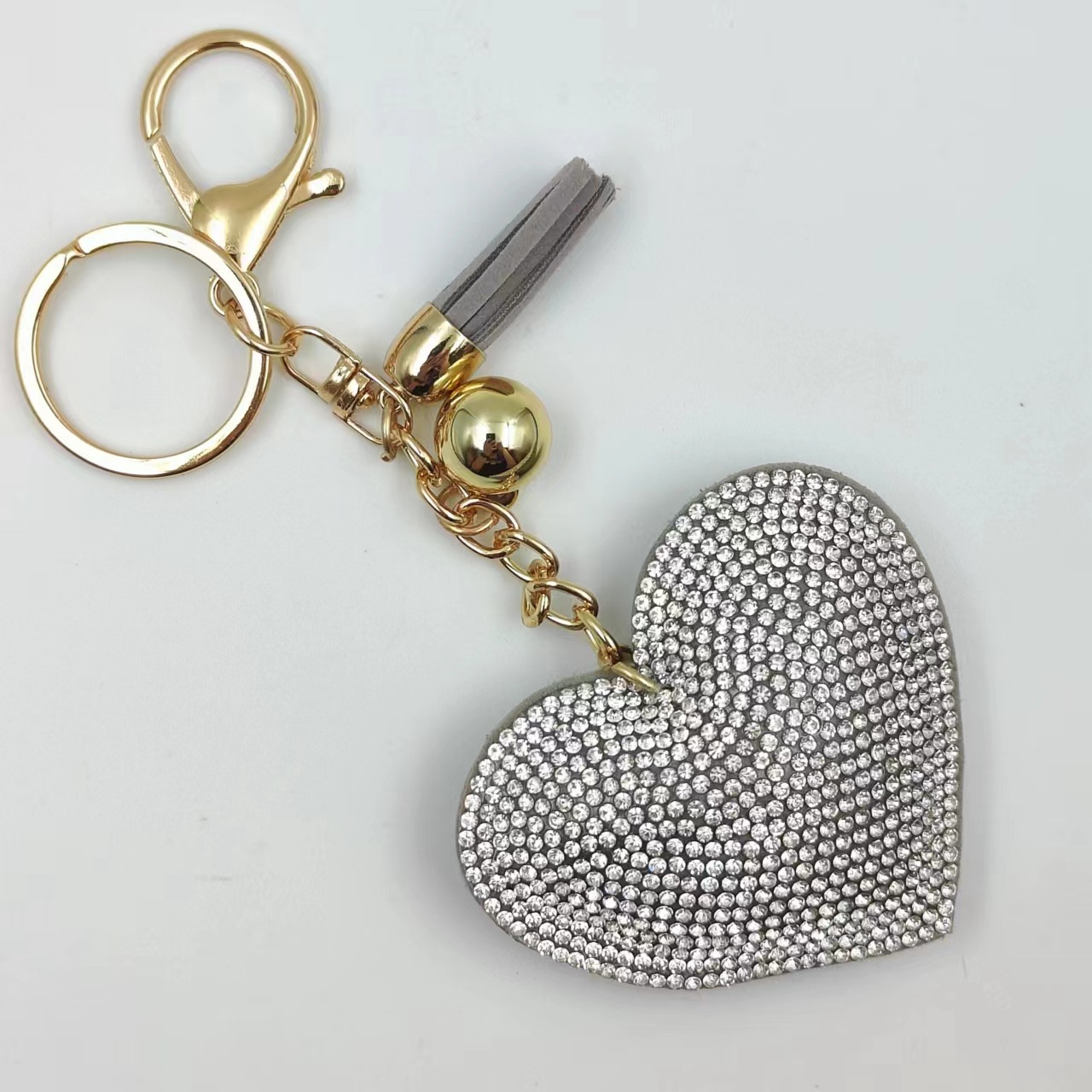 New DIY jewelry small Chanel style peach heart hot diamond leather keychain crystal diamond heart tassel bag pendant