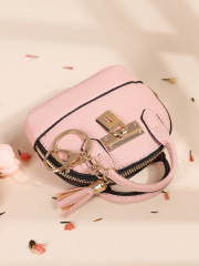 Pink semicircular handbag