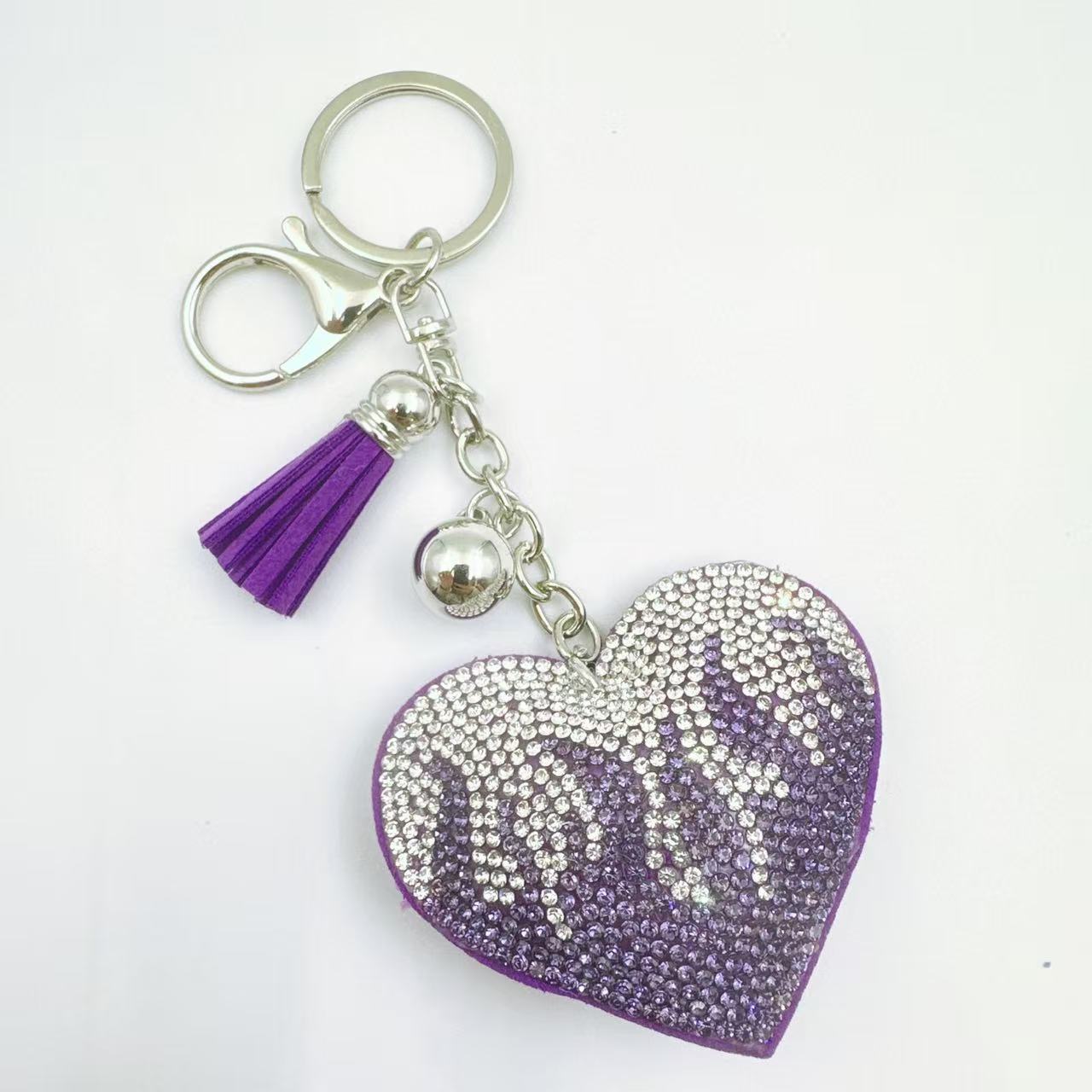 New cute rhinestone keychain for women, fashionable flame heart tassel bag charm, Valentine's Day gift.