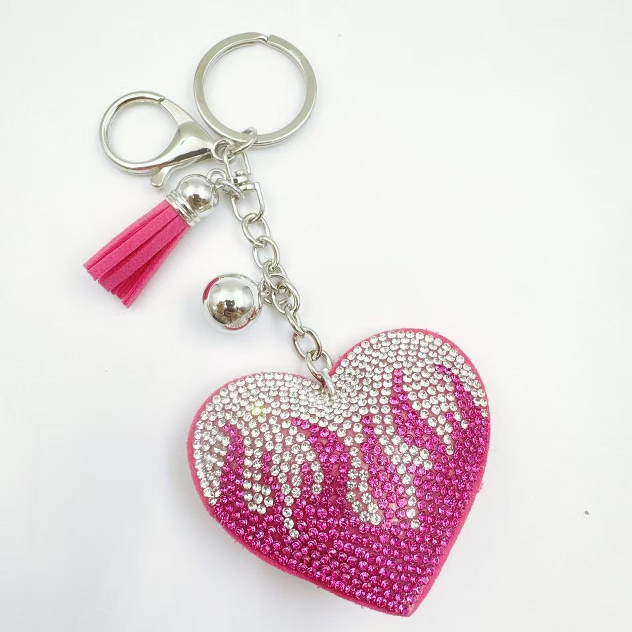 New cute rhinestone keychain for women, fashionable flame heart tassel bag charm, Valentine's Day gift.
