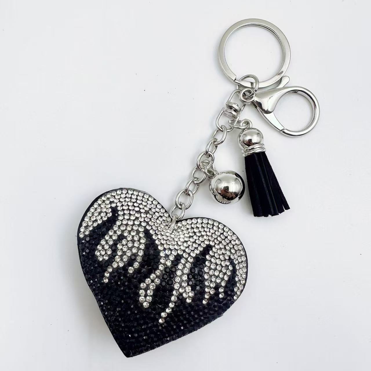 New cute rhinestone keychain for women, fashionable flame heart tassel bag charm, Valentine's Day gift.