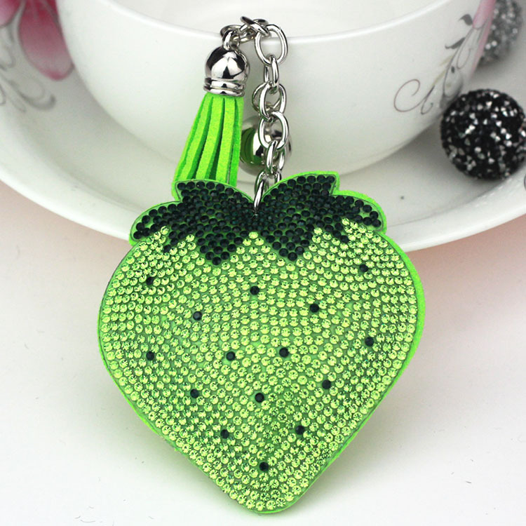 Hot-selling tassel rhinestone strawberry women's bag charm on AliExpress, fashionable Korean style, hot-stamped rhinestone two-tone key.