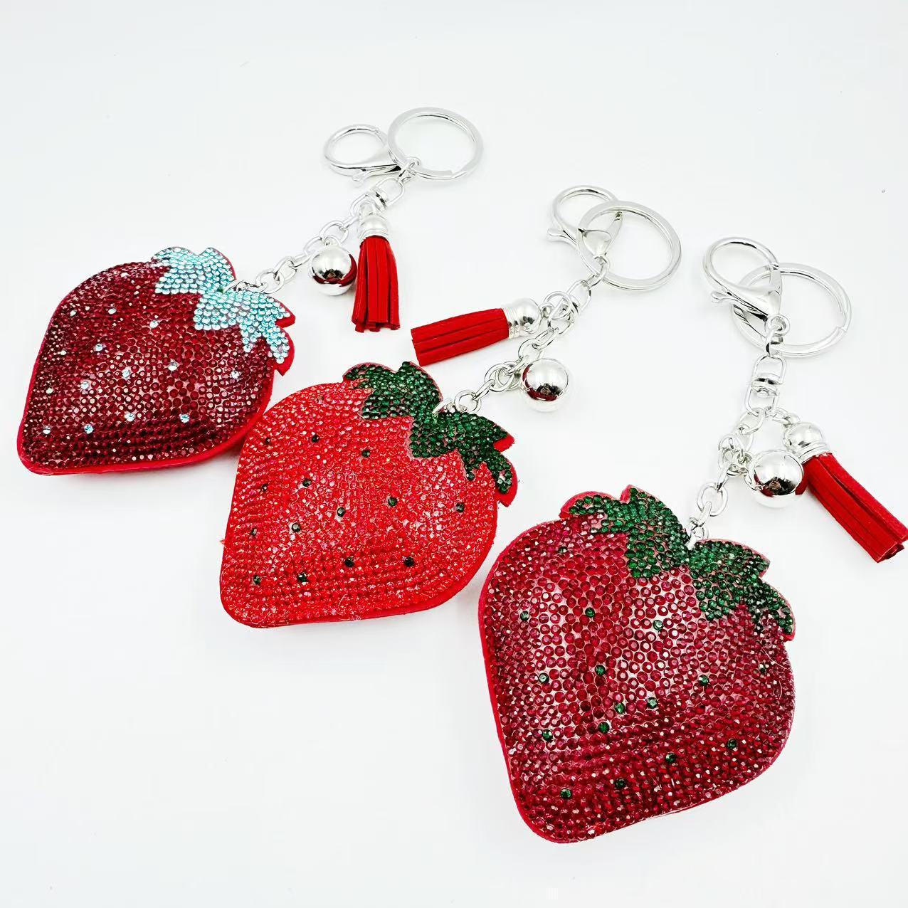 Hot-selling tassel rhinestone strawberry women's bag charm on AliExpress, fashionable Korean style, hot-stamped rhinestone two-tone key.