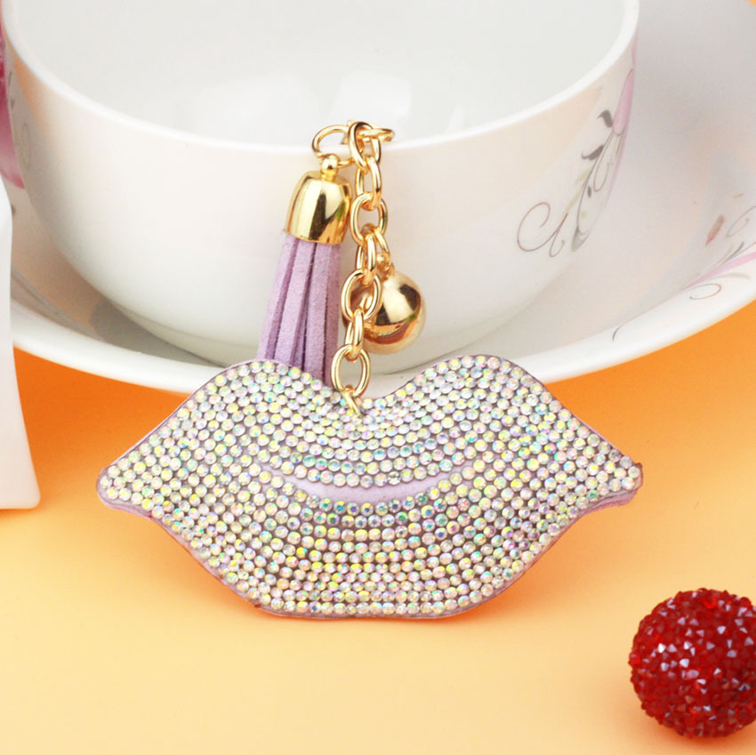 Fashionable lip-shaped leather tassel keychain for phones, bags, and accessories; Valentine's Day gift wholesale.