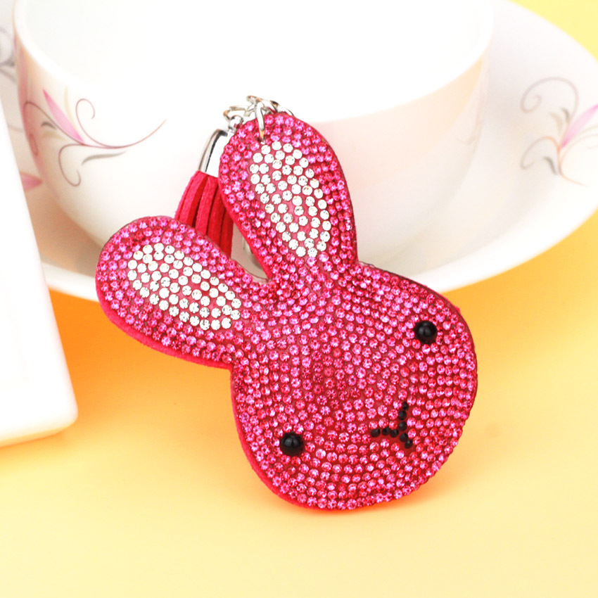 Factory direct sales of popular jewelry, bag charms, Korean velvet rhinestone cartoon rabbit head keychains on AliExpress.