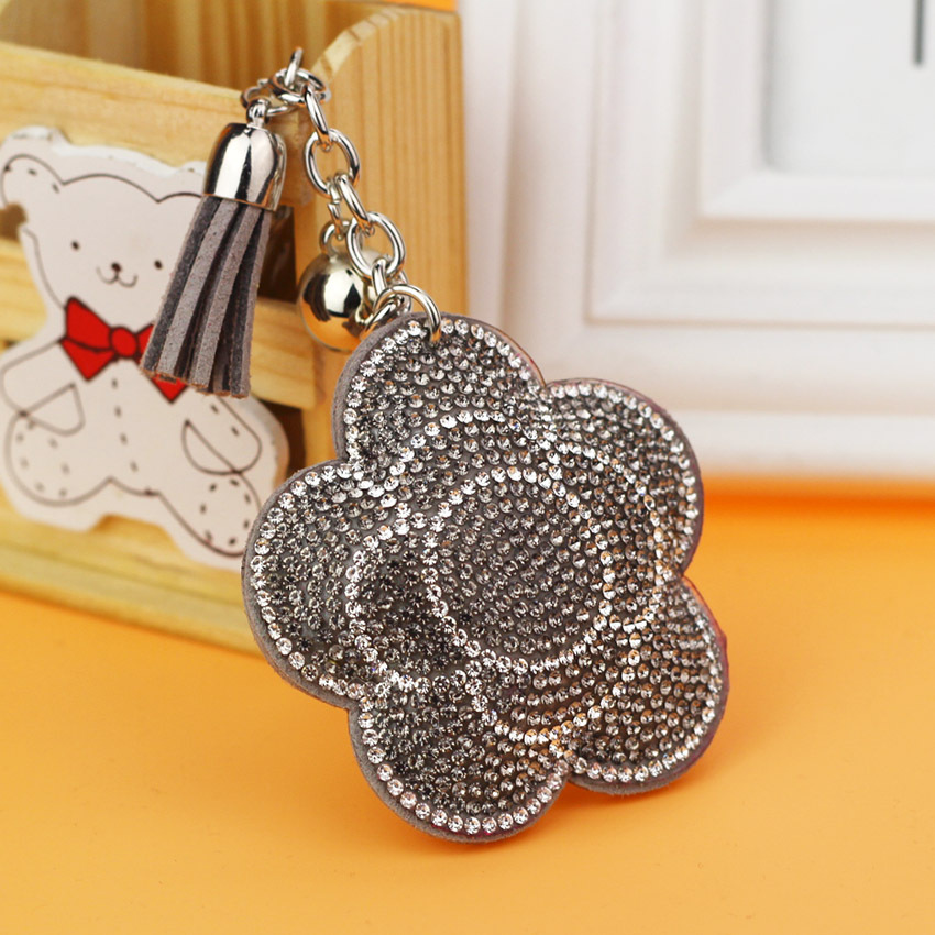 Popular export item: Velvet tassel rhinestone keychain, cute plum blossom women's bag charm, wholesale tassel keychain.