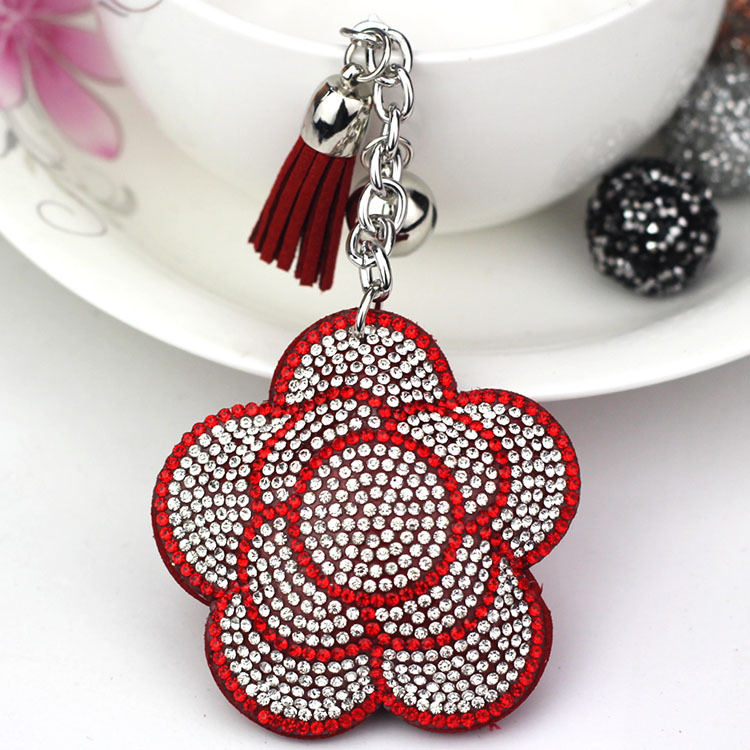 Popular export item: Velvet tassel rhinestone keychain, cute plum blossom women's bag charm, wholesale tassel keychain.