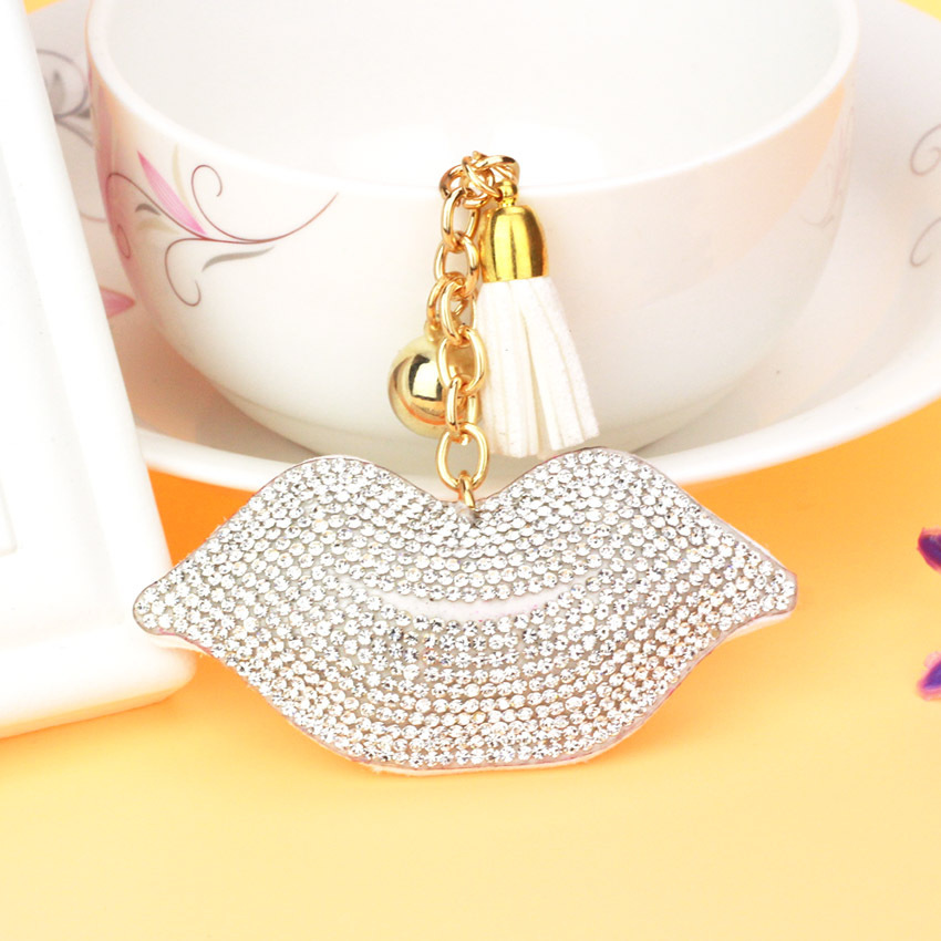 Fashionable lip-shaped leather tassel keychain for phones, bags, and accessories; Valentine's Day gift wholesale.