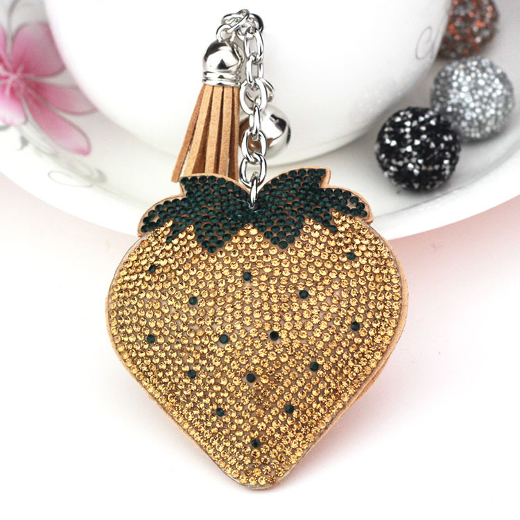 Hot-selling tassel rhinestone strawberry women's bag charm on AliExpress, fashionable Korean style, hot-stamped rhinestone two-tone key.
