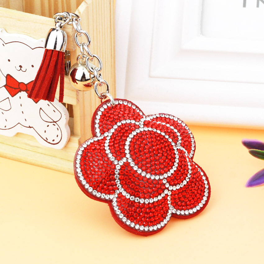 Popular export item: Velvet tassel rhinestone keychain, cute plum blossom women's bag charm, wholesale tassel keychain.