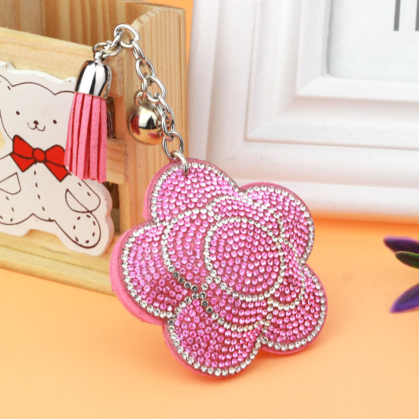 Popular export item: Velvet tassel rhinestone keychain, cute plum blossom women's bag charm, wholesale tassel keychain.