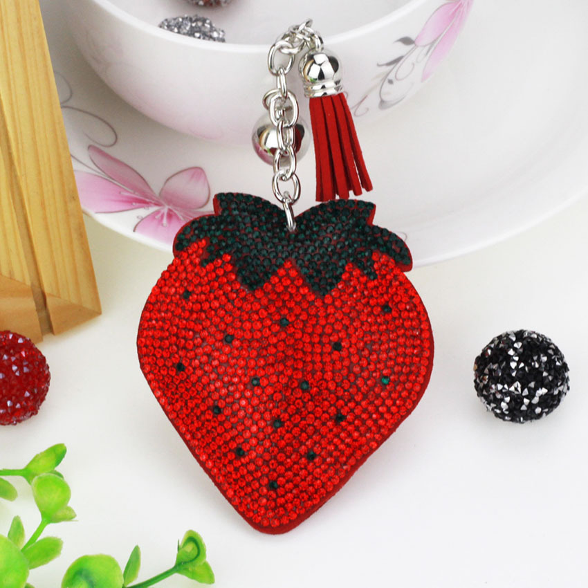 Hot-selling tassel rhinestone strawberry women's bag charm on AliExpress, fashionable Korean style, hot-stamped rhinestone two-tone key.