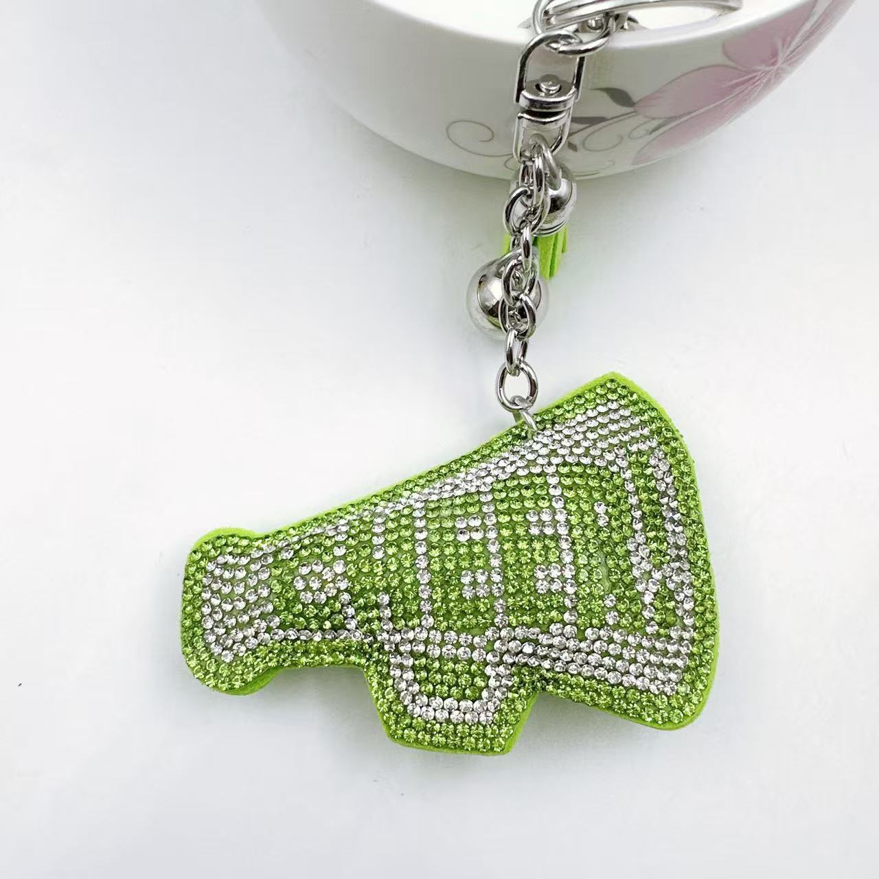 New Korean style velvet rhinestone letter CHEER keychain, a gift for customers, featuring a rhinestone horn pattern on a bag or key chain.