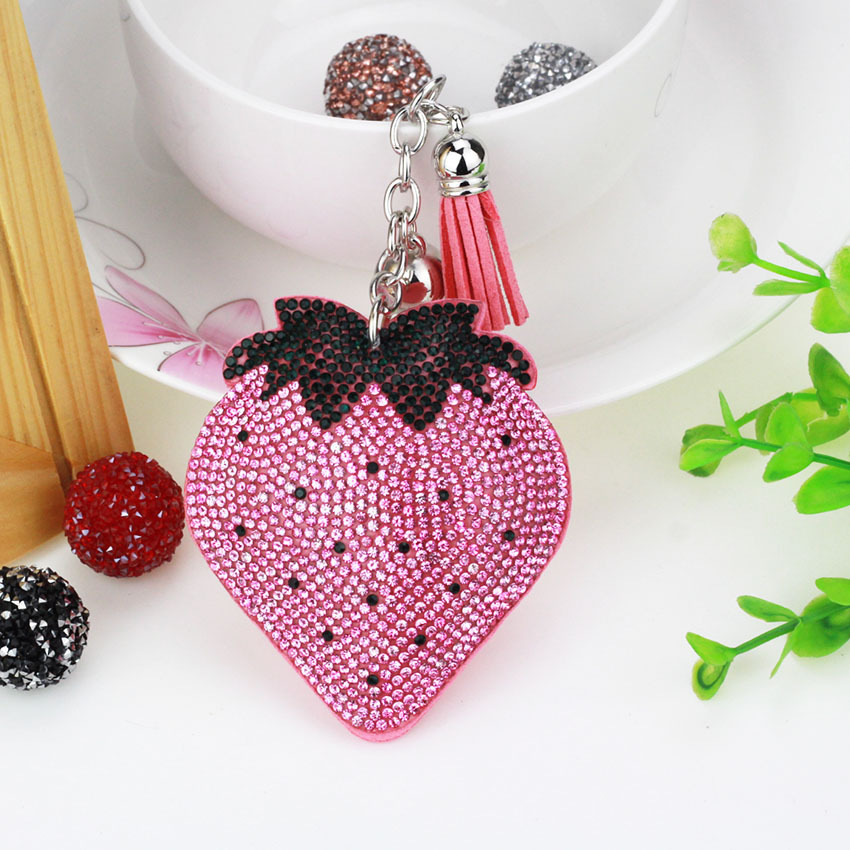 Hot-selling tassel rhinestone strawberry women's bag charm on AliExpress, fashionable Korean style, hot-stamped rhinestone two-tone key.