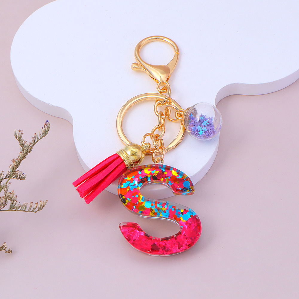 Wholesale red sequined letter keychains, English name pendants, bag charms, party favors.