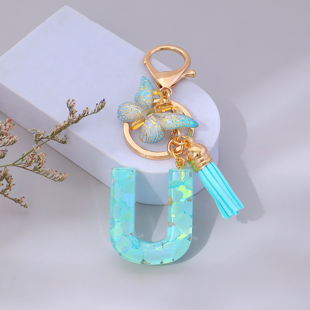 Wholesale green heart-shaped sequined letter keychains, English letters, pendants, bag charms, party gifts.