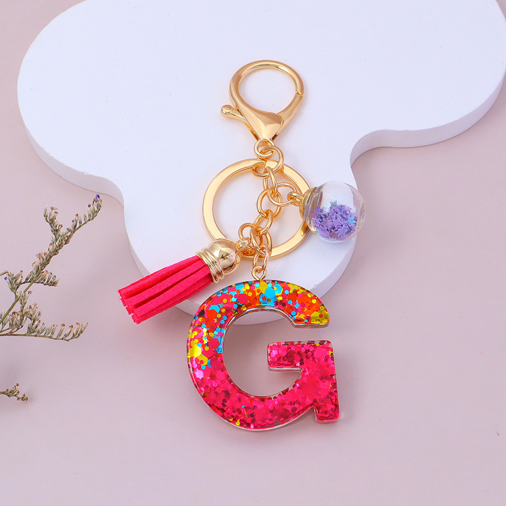Wholesale red sequined letter keychains, English name pendants, bag charms, party favors.