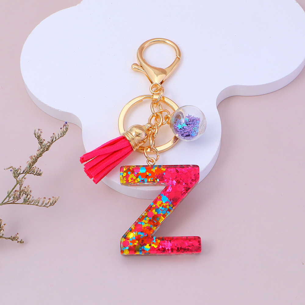 Wholesale red sequined letter keychains, English name pendants, bag charms, party favors.