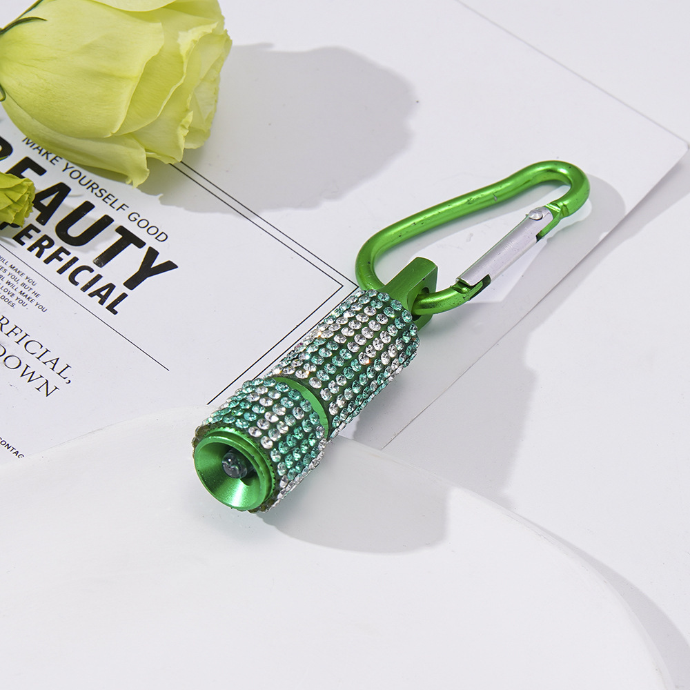 Wholesale LED stylish rhinestone-encrusted mini flashlights, carabiner mini emergency flashlights, keychains, pendants, etc.