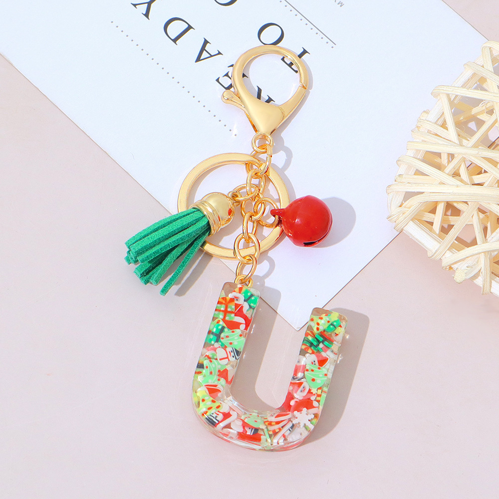 Wholesale Christmas-themed resin English letter keychains with tassels, bag charms, Christmas party gifts.