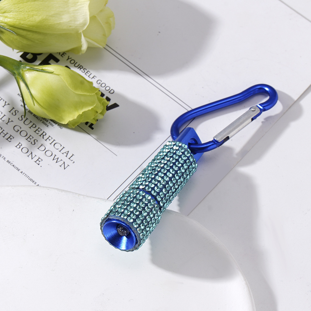 Wholesale LED stylish rhinestone-encrusted mini flashlights, carabiner mini emergency flashlights, keychains, pendants, etc.