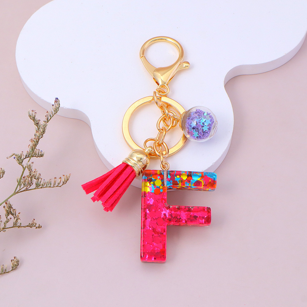 Wholesale red sequined letter keychains, English name pendants, bag charms, party favors.
