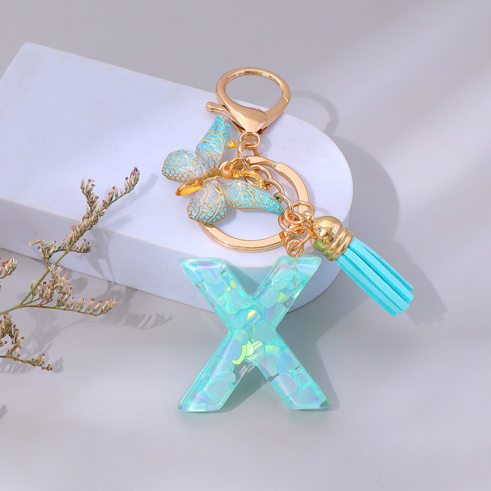 Wholesale green heart-shaped sequined letter keychains, English letters, pendants, bag charms, party gifts.