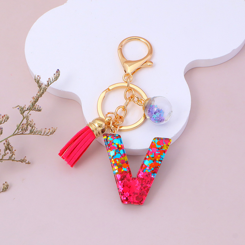 Wholesale red sequined letter keychains, English name pendants, bag charms, party favors.
