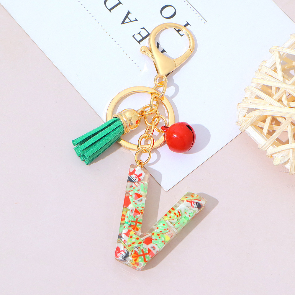 Wholesale Christmas-themed resin English letter keychains with tassels, bag charms, Christmas party gifts.