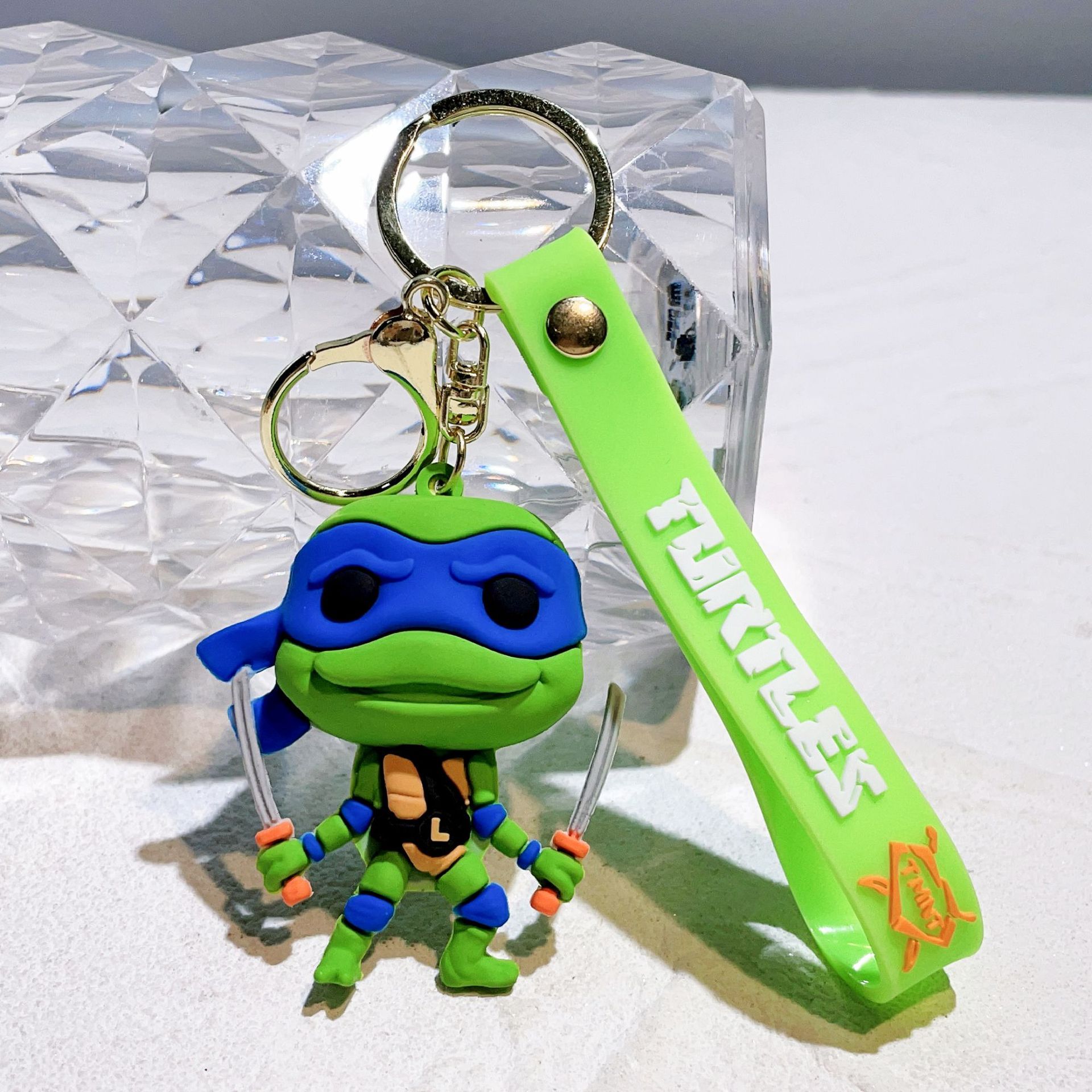 Wholesale cute and creative cartoon Teenage Mutant Ninja Turtles silicone keychains, key rings, figurines, and pendants.