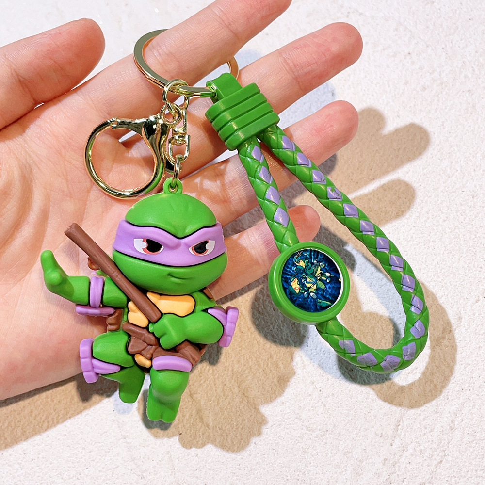 Wholesale cute and creative cartoon Teenage Mutant Ninja Turtles silicone keychains, key rings, figurines, and pendants.