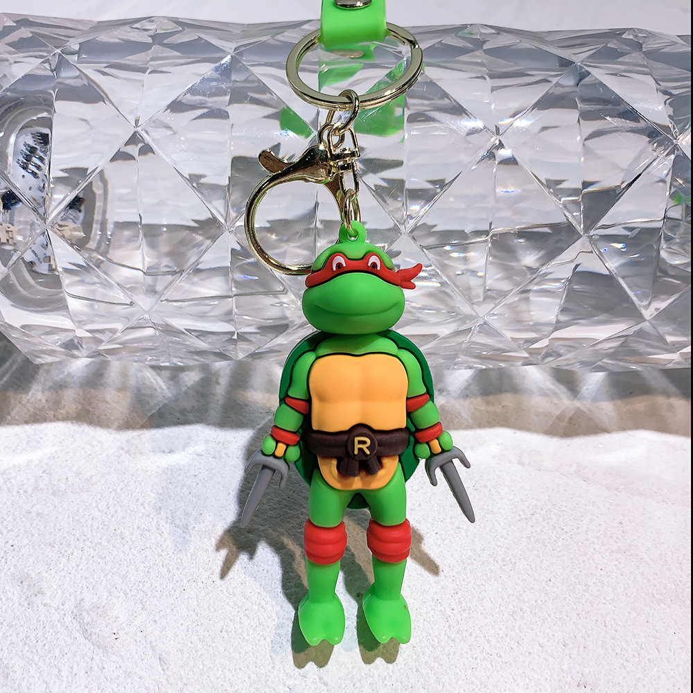 Wholesale cute and creative cartoon Teenage Mutant Ninja Turtles silicone keychains, key rings, figurines, and pendants.