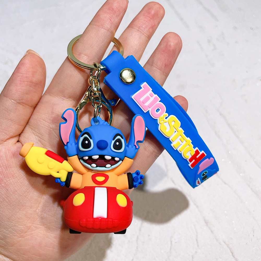 Wholesale 100 kinds of classic Stitch keychains, accessories, PVC, small gift pendants.