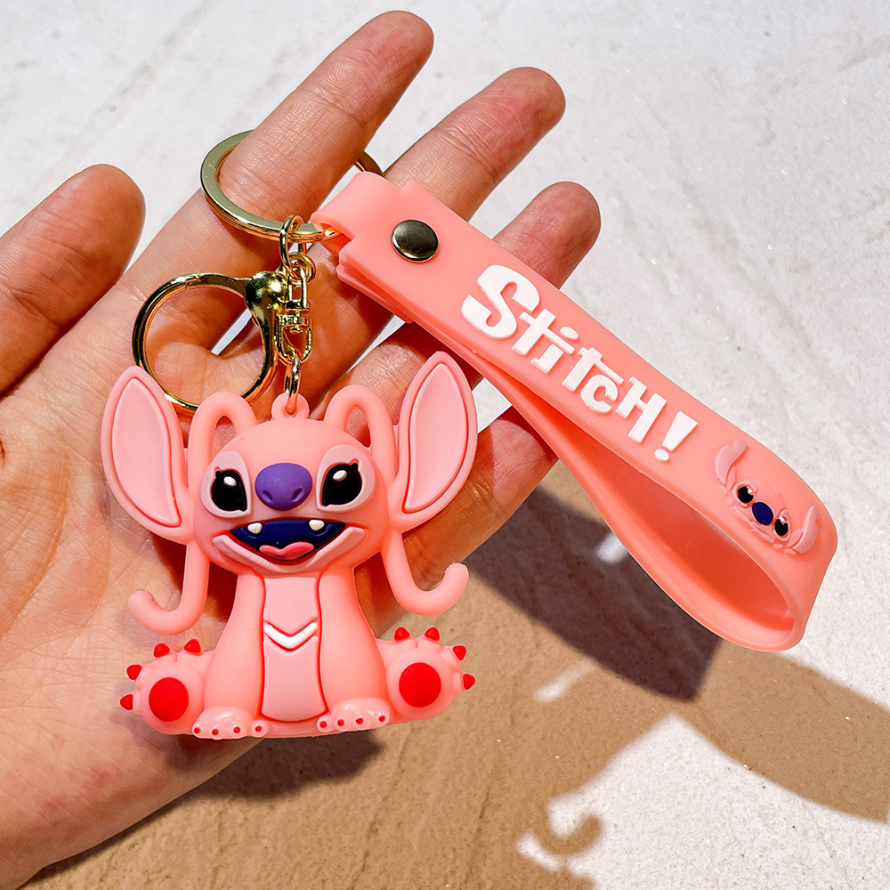 Wholesale 100 kinds of classic Stitch keychains, accessories, PVC, small gift pendants.