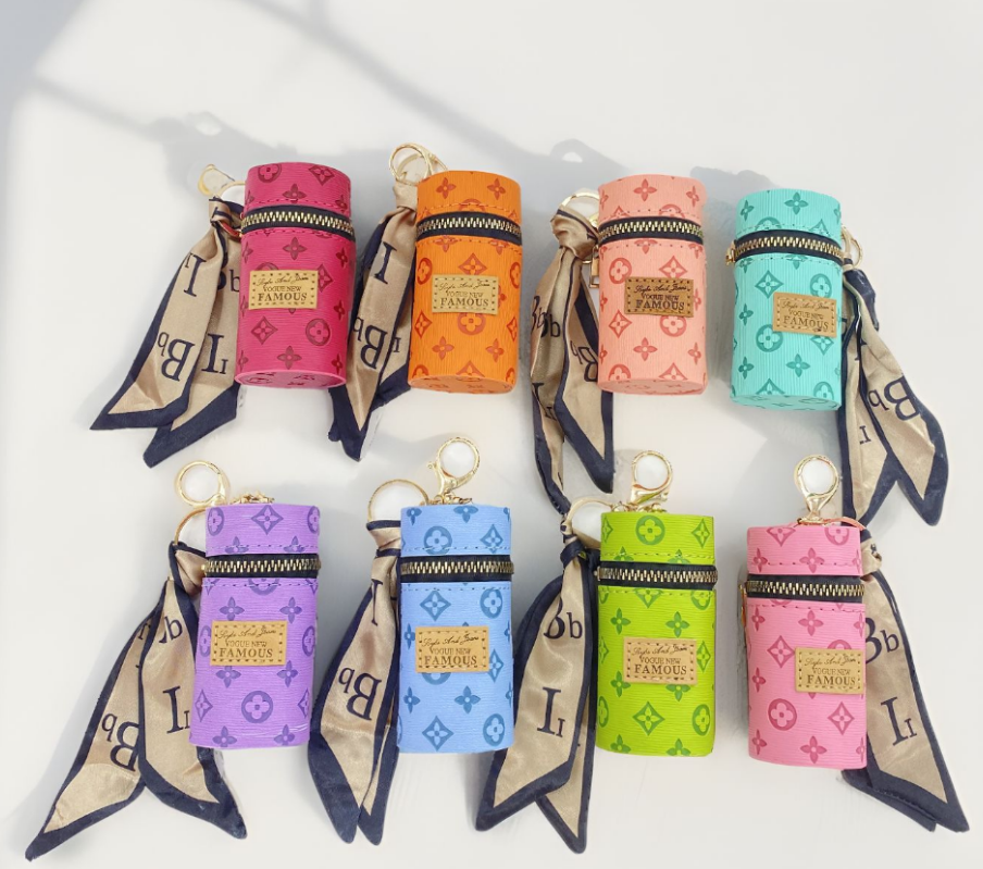 Versatile, high-value, portable, fashionable, embossed lipstick bag, coin purse, convenient mini headphone bag pendant