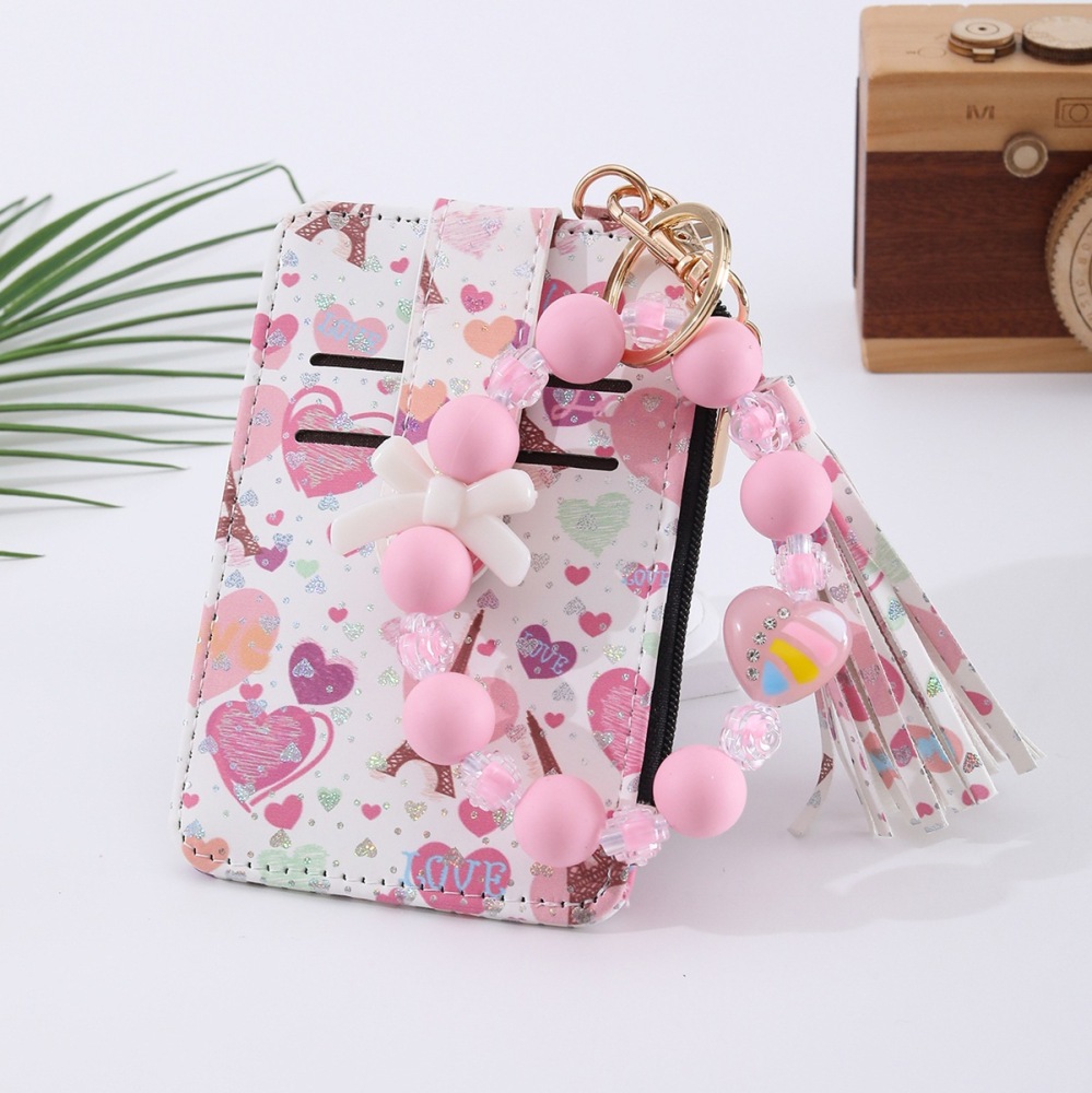 Amazon's best-selling spring-themed silicone bracelet with floral, heart, and bow designs, beaded card holder, coin purse, and charm.
