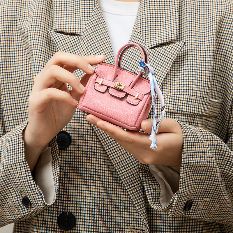 H brand's new mini charm for lipstick bags, earphone bags, car key bags, platinum bags, creative and cute bag ornaments.